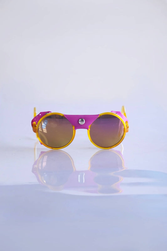 Orange and violet CÉBÉ Vintage Glacier Sunglasses on white background