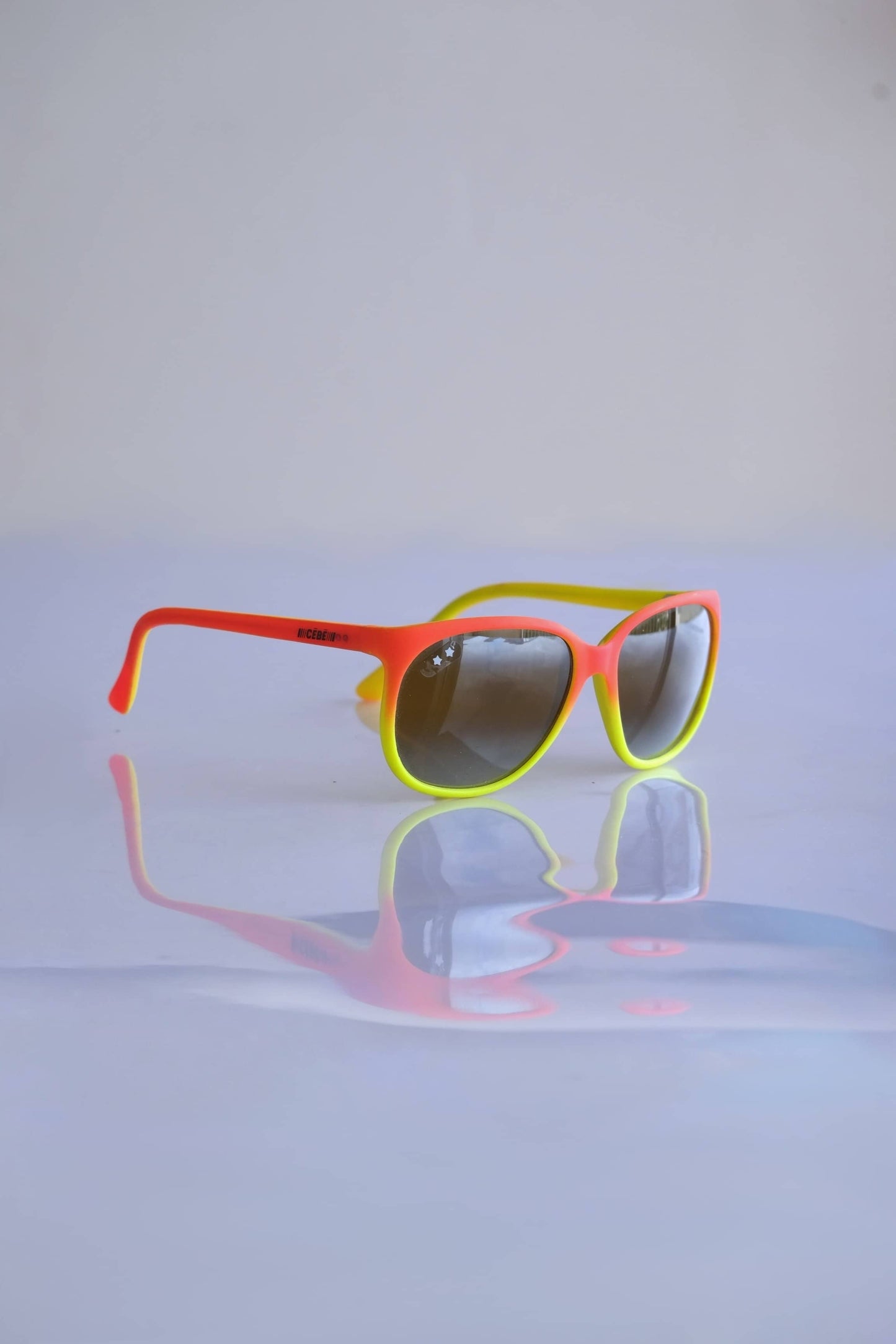 CÉBÉ Vintage Neon & Mirrored Sunglasses in orange and yellow