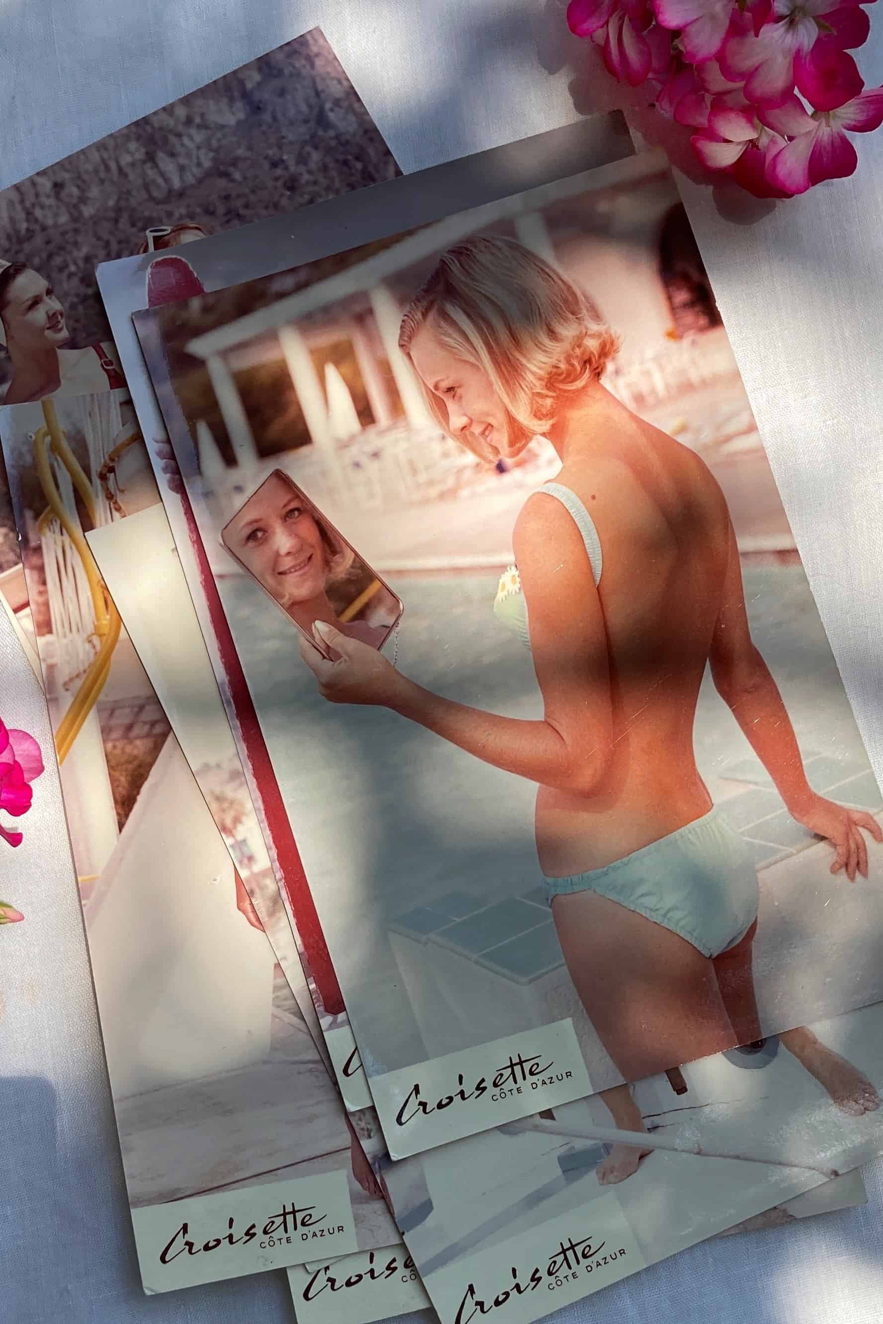 postcard of a vintage bikini worn by a model by the pool