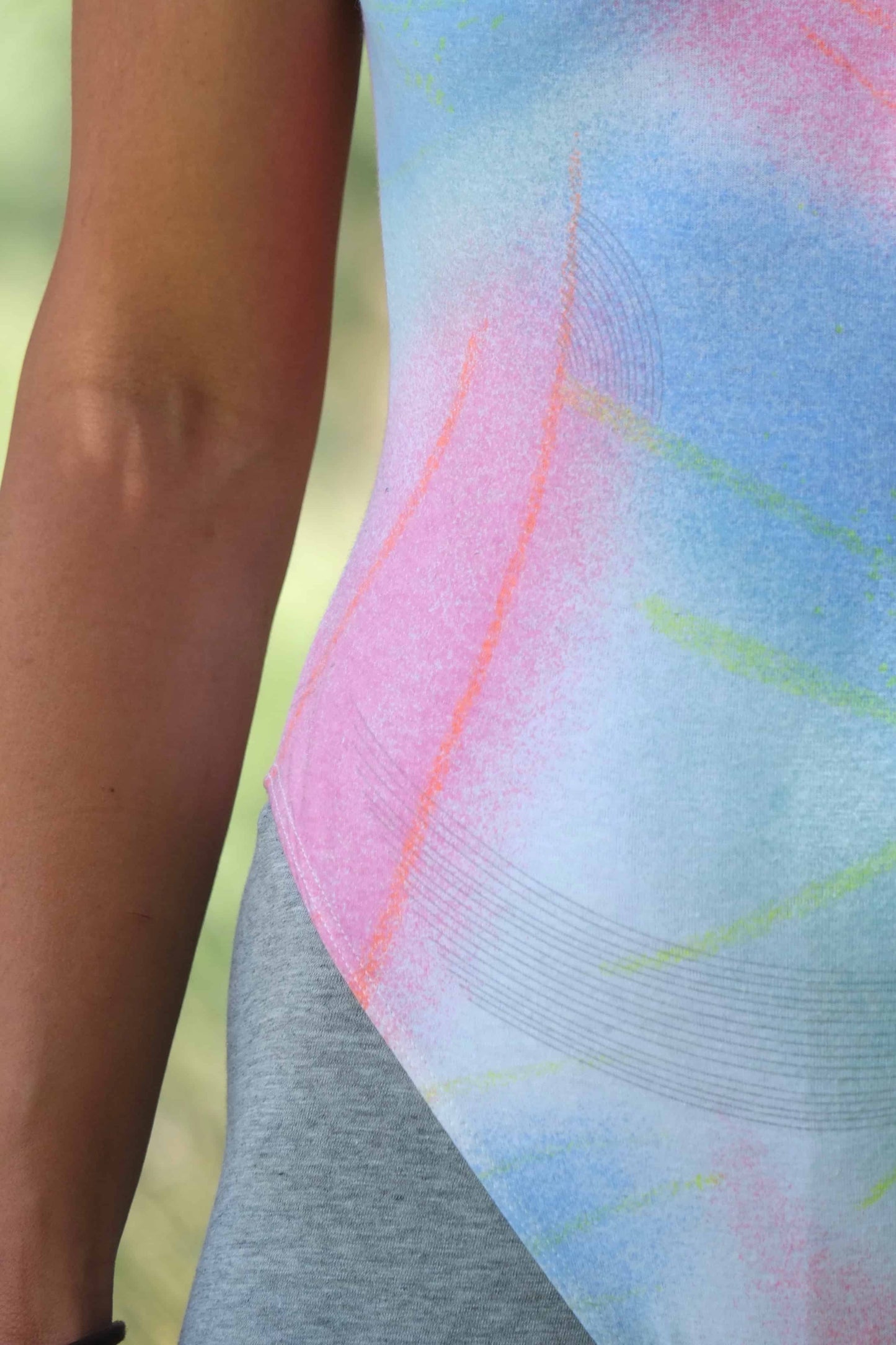 Close-up of the vintage Danskin leotard's tie-dye pattern and fabric detail.