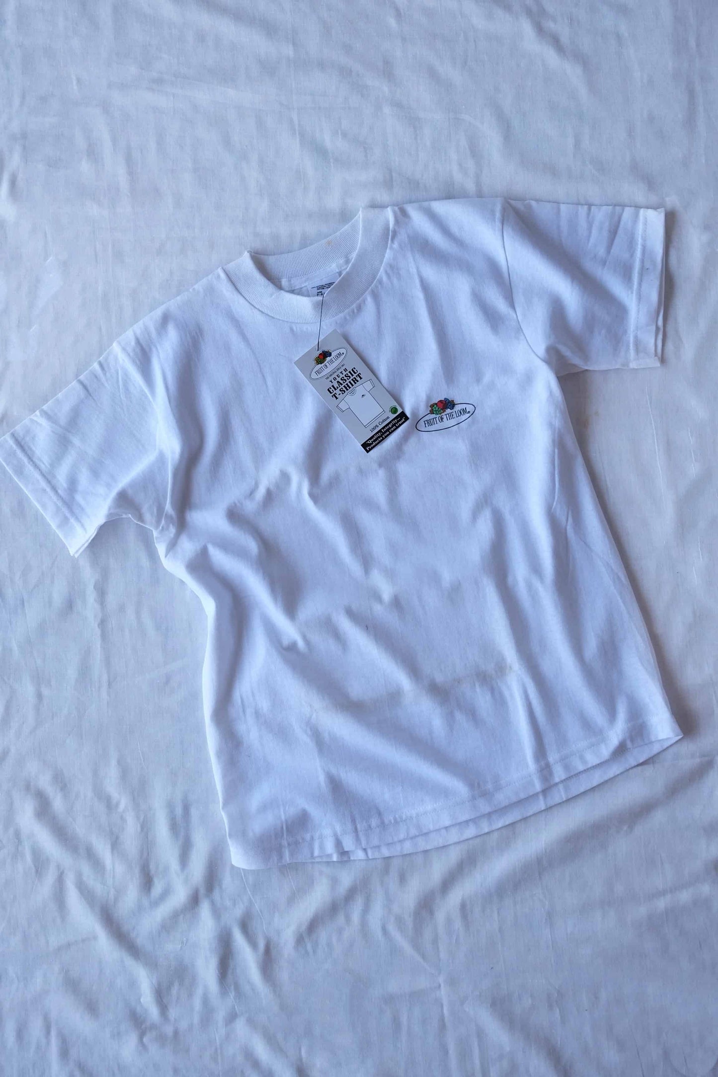 FRUIT OF THE LOOM Kids Classic T-shirt in color white laid on white background