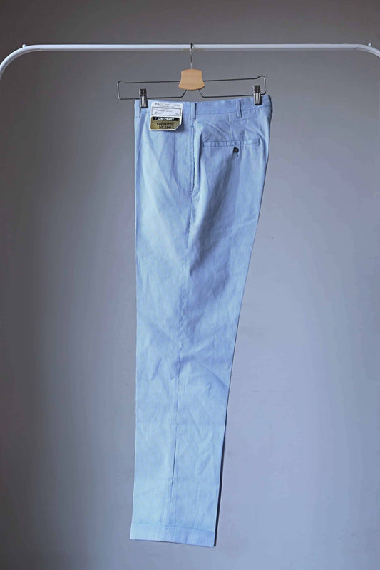 Side view of LEE Prest Vintage 60's Classic Pinstripe Cord Slacks in white and blue stripes on hanger