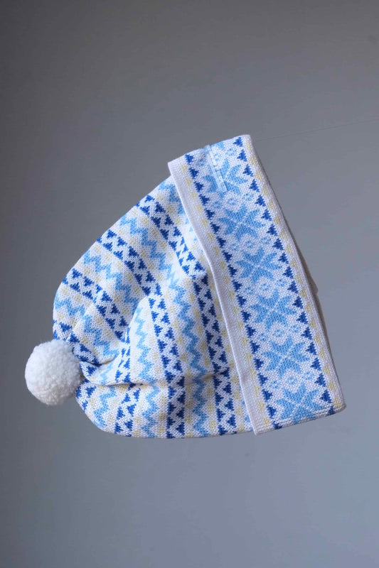 LÖFFLER 90's Vintage Ski Beanie in white and light blue snowflake design