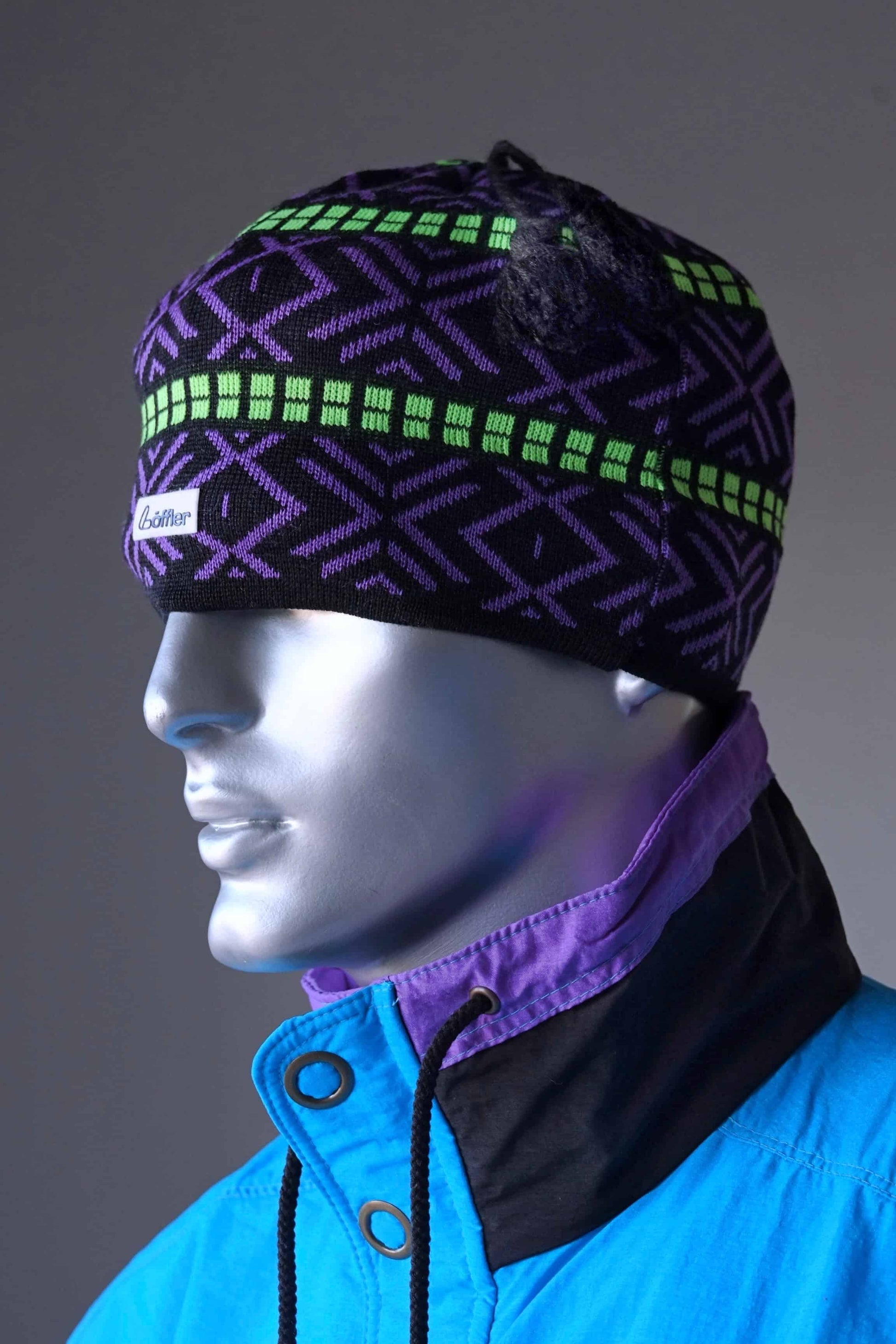 LÖFFLER 90's Jacquard Beanie black/purple on mannequin