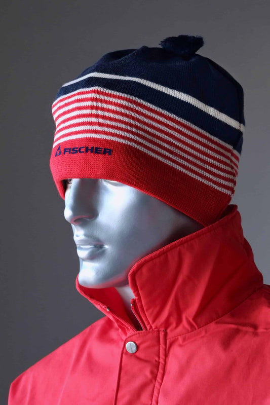 LÖFFLER Fischer Ski Beanie red and navy with white stripes on mannequin