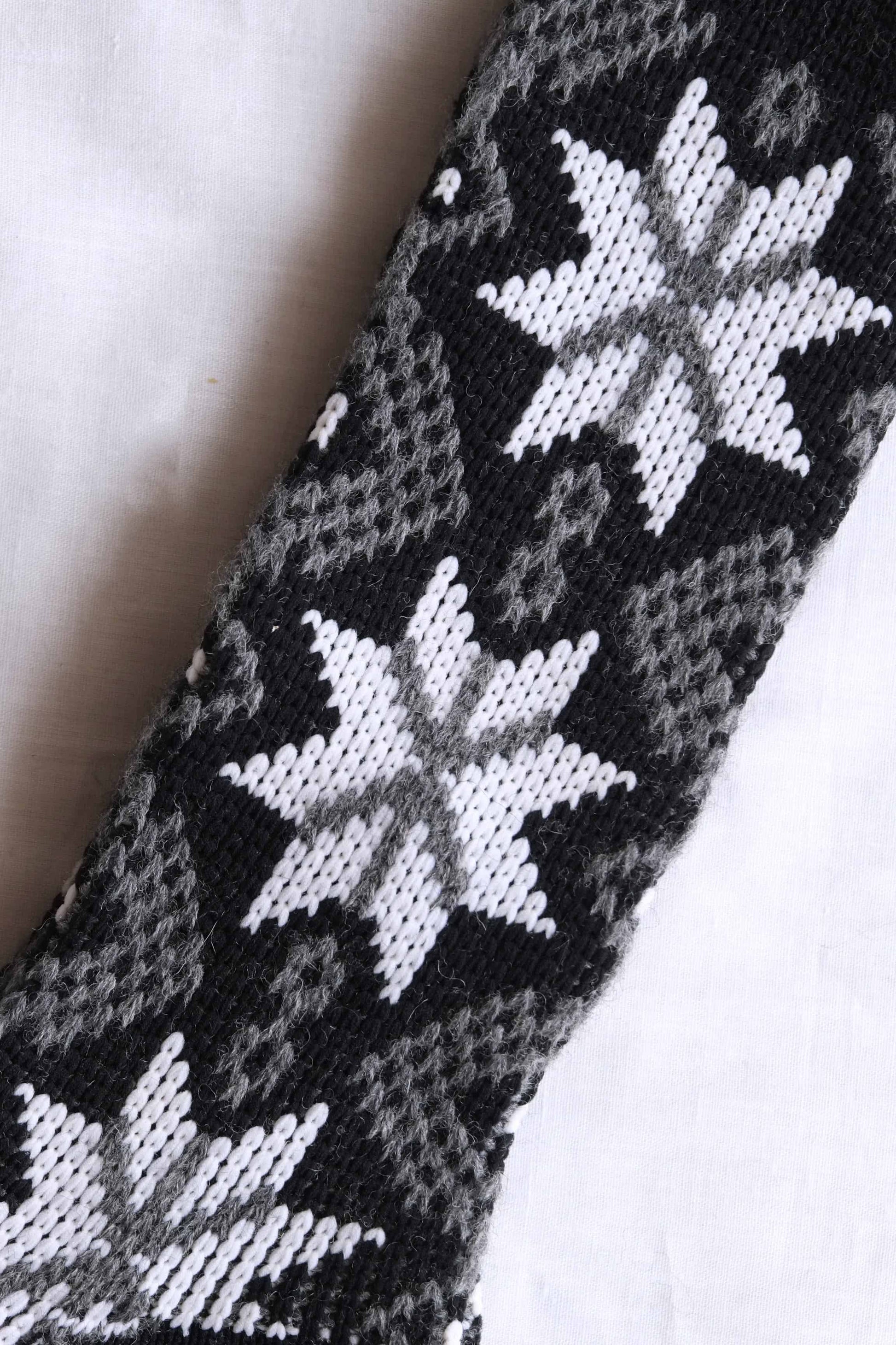 close view of black and white Vintage Knee high Jacquard Socks