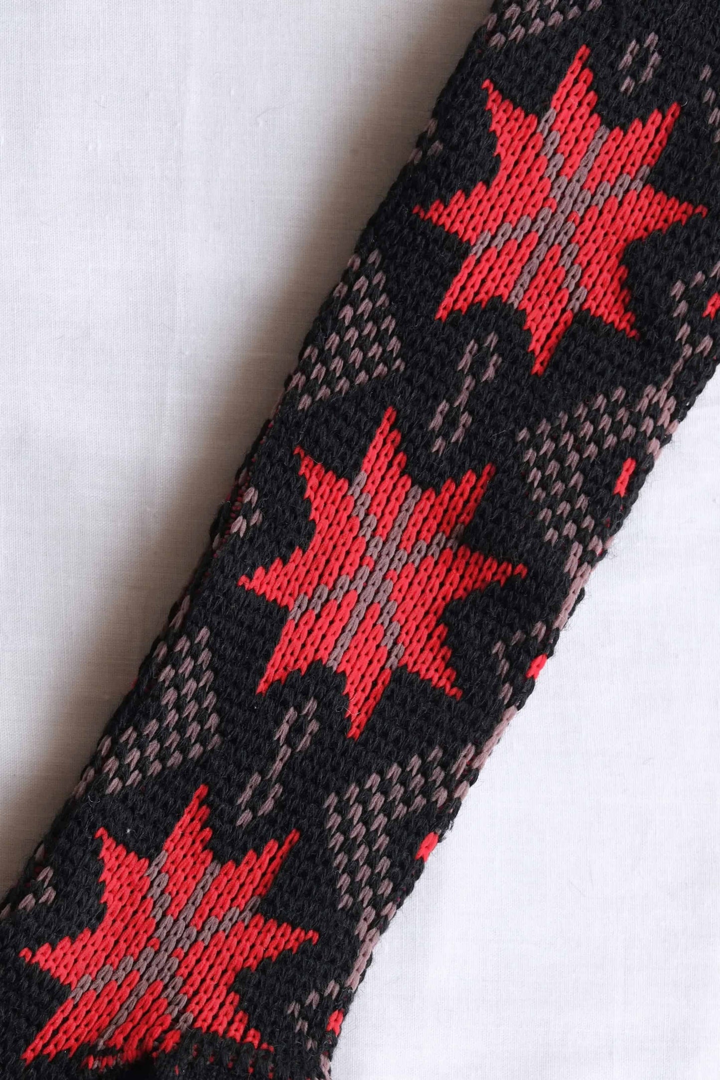 Close view of black and red Vintage Knee high Jacquard Socks