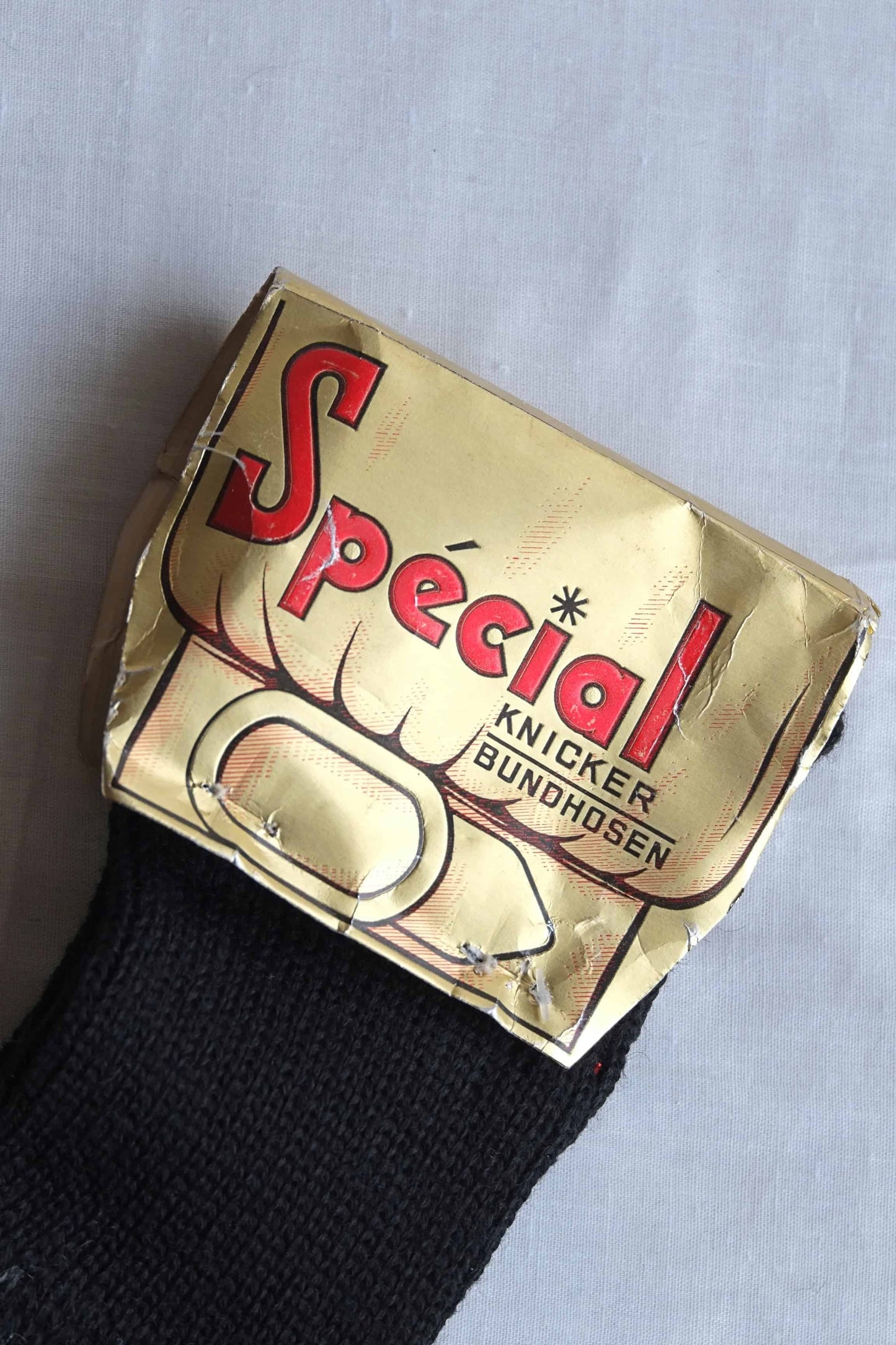 Label that says Special on black Vintage Knee high Jacquard Socks