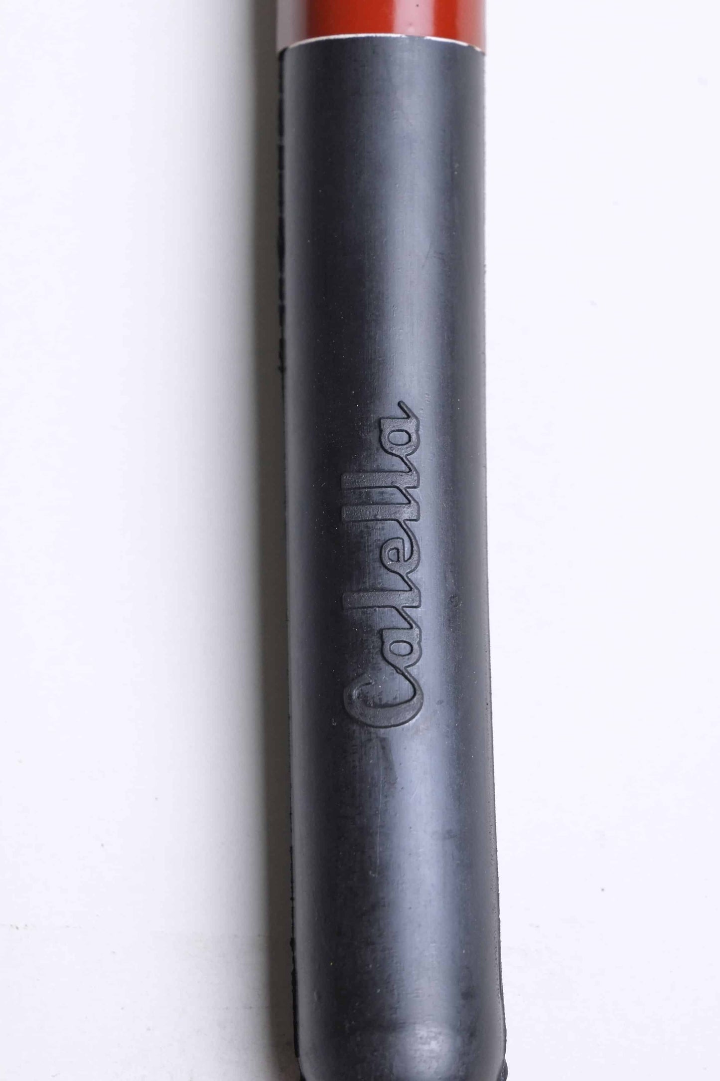 Close up of a Vintage Nemrod Calella telescopico snorkel on white background, showing the word Calella