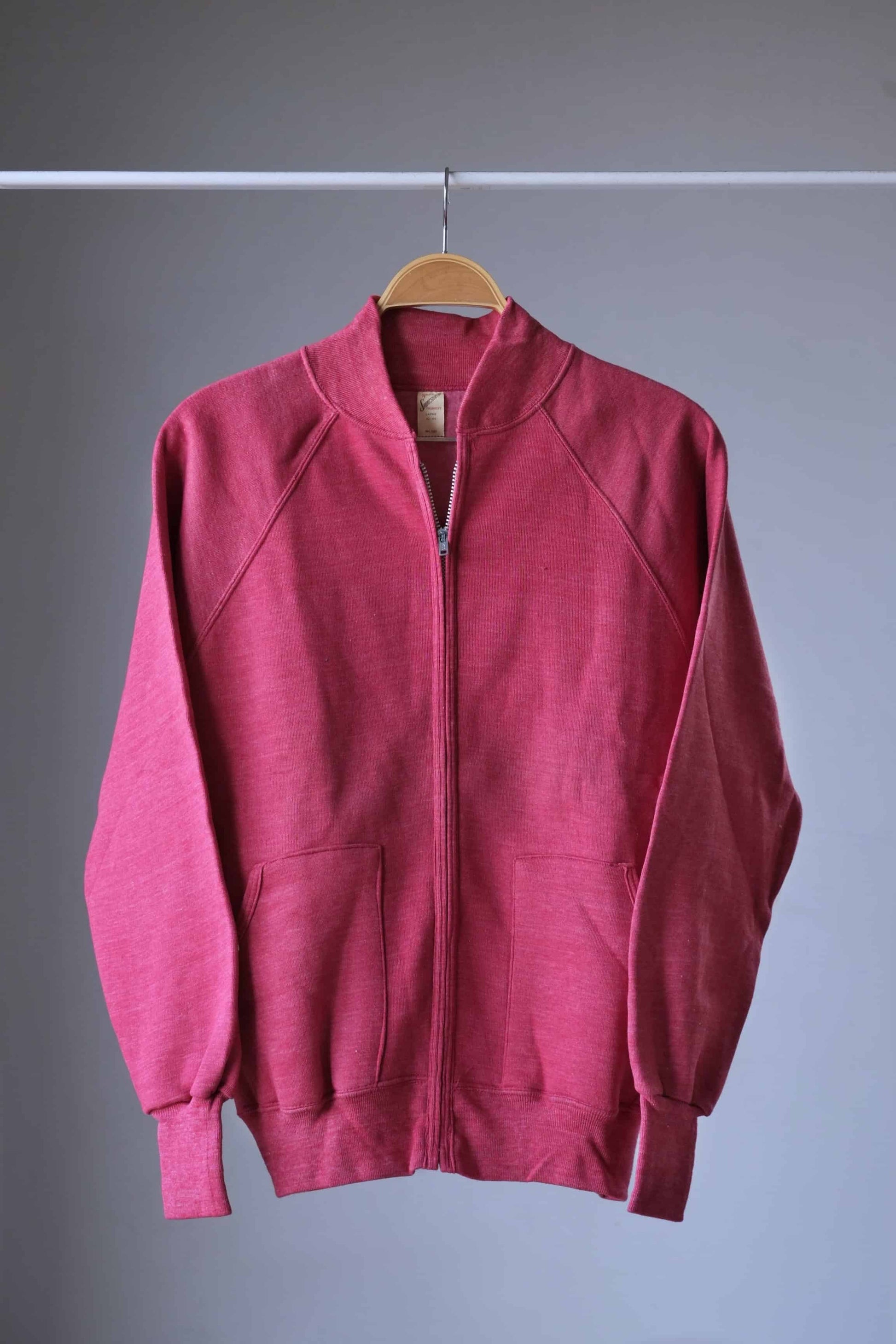 Heether red zipper sweatshirt on hanger