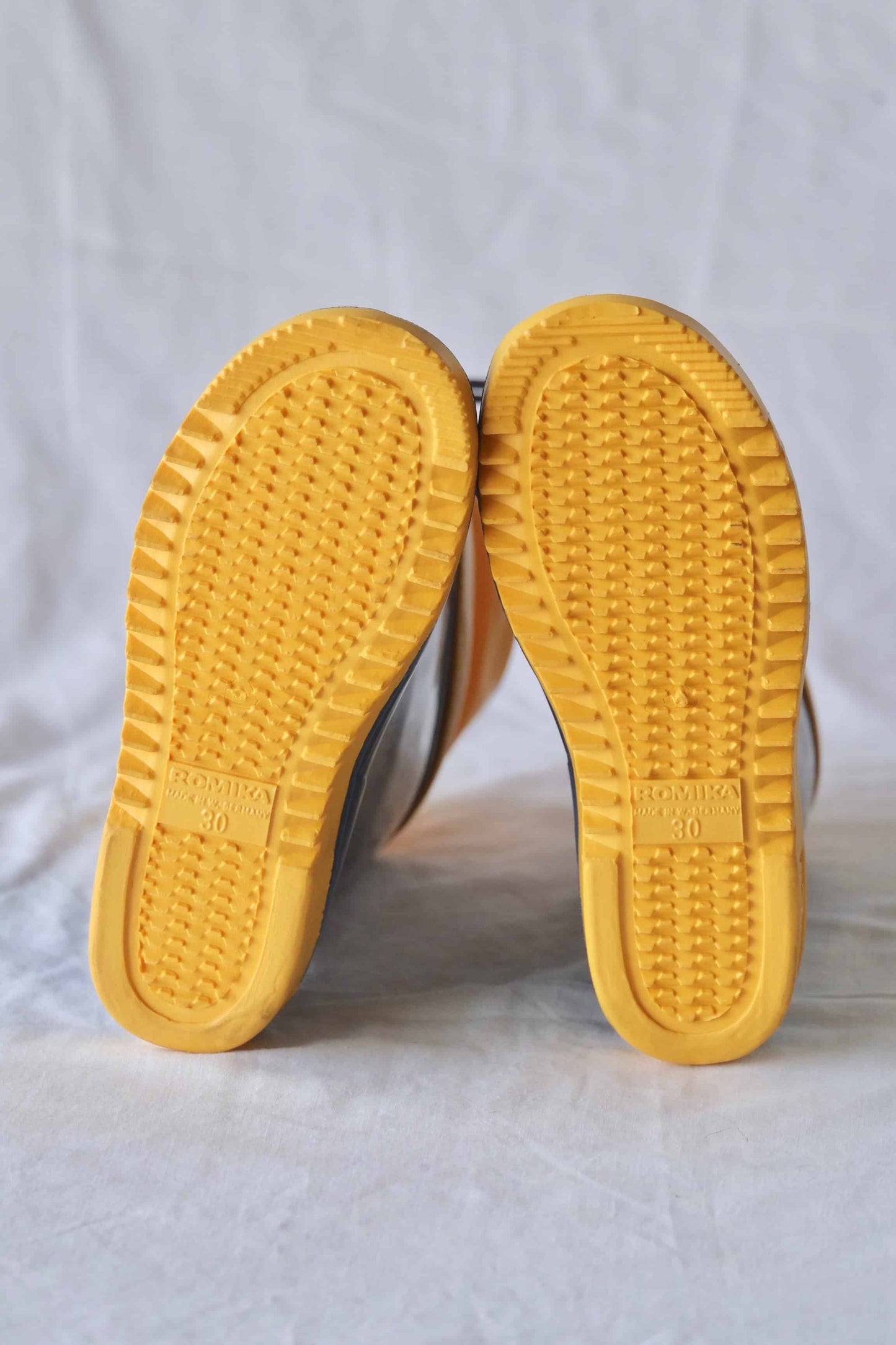 Yellow rubber soles of ROMIKA Bobby Rain Boots