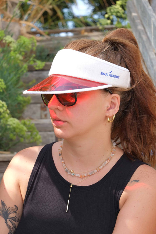 model wearing SNAUWEART Retro Visor outdoors
