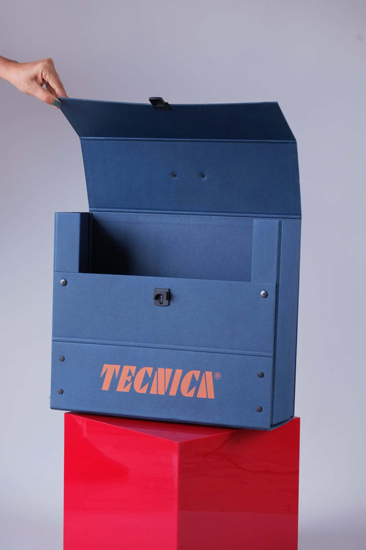 Open view of the Tecnica 90s promotional briefcase, showing interior compartment space.