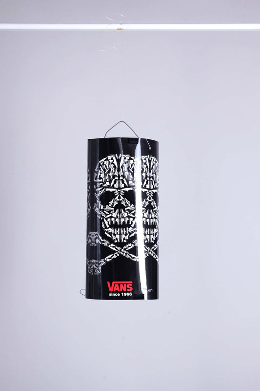 VANS skull mobile display fully assembled and suspended, showcasing skull pattern made of sneakers.