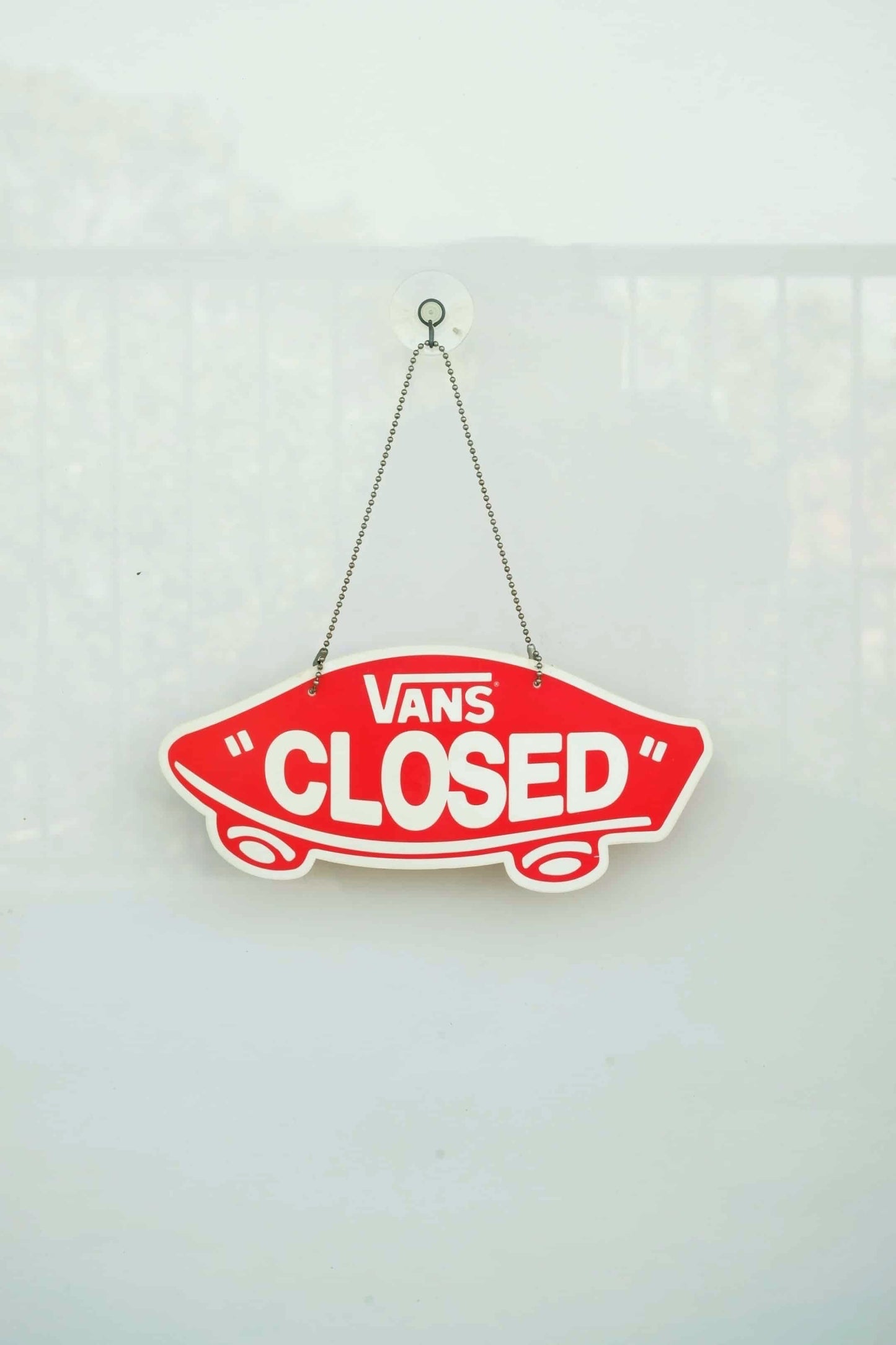 VANS Open/Closed Door Sign on white background. the word CLOSED is visible.