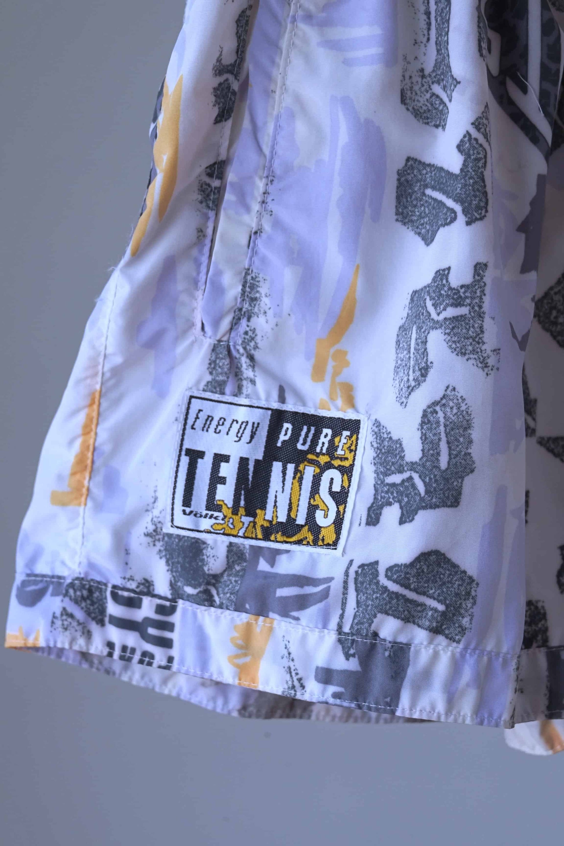 Details of vintage printed volkl tennis shorts on hanger