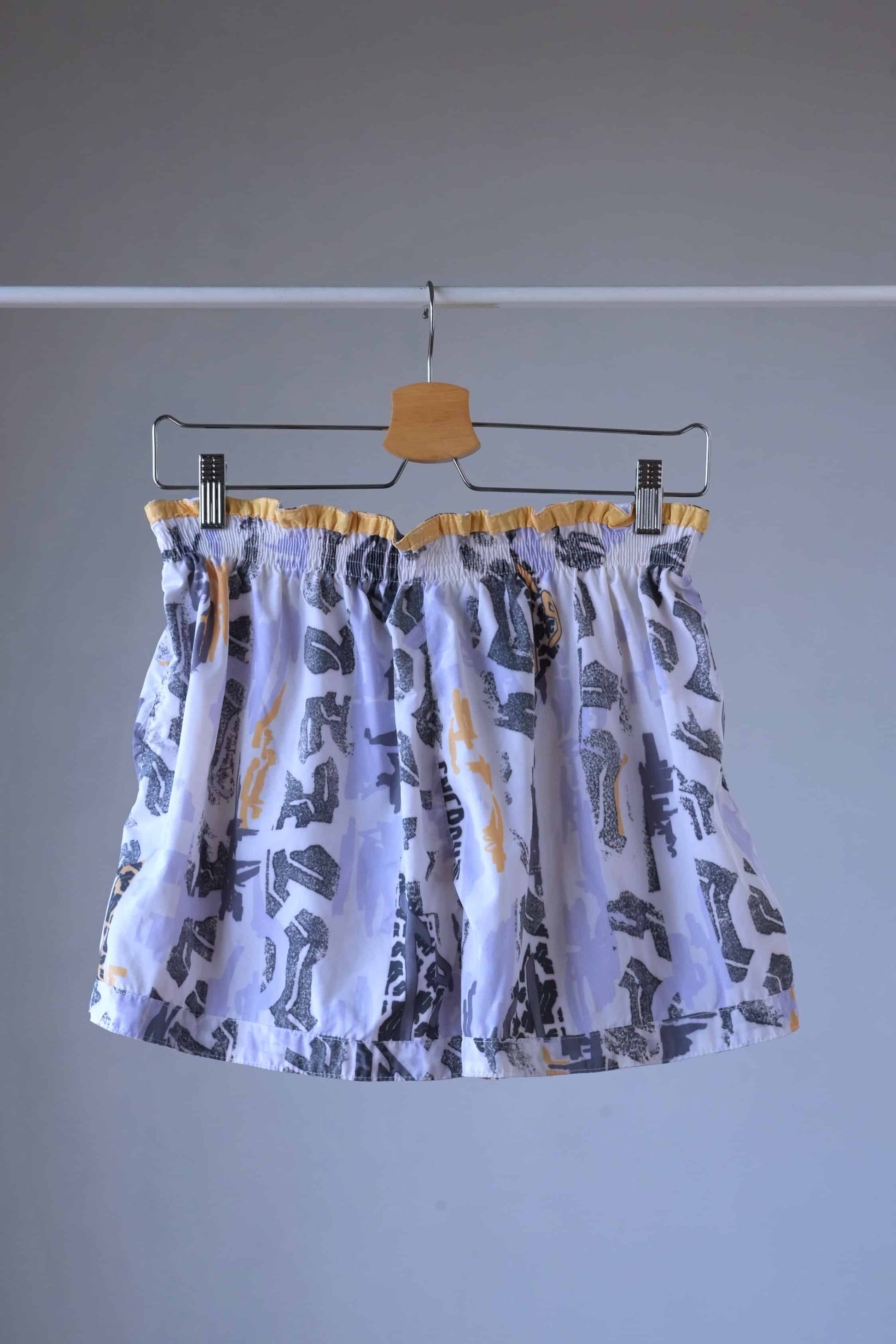 vintage printed volkl tennis shorts on hanger from the back