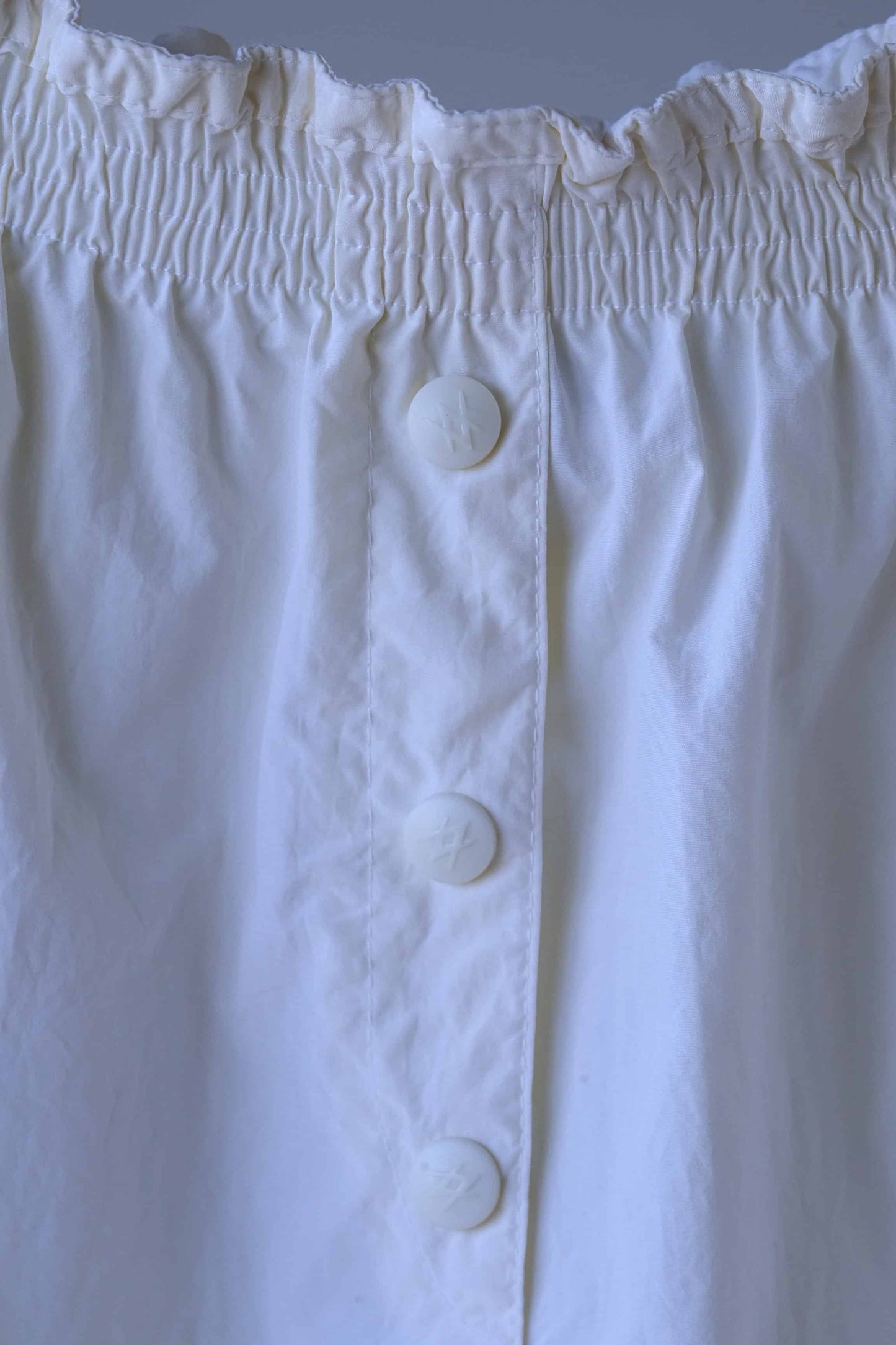 Close shot of buttons on VÖLKL Vintage Women's Tennis Shorts