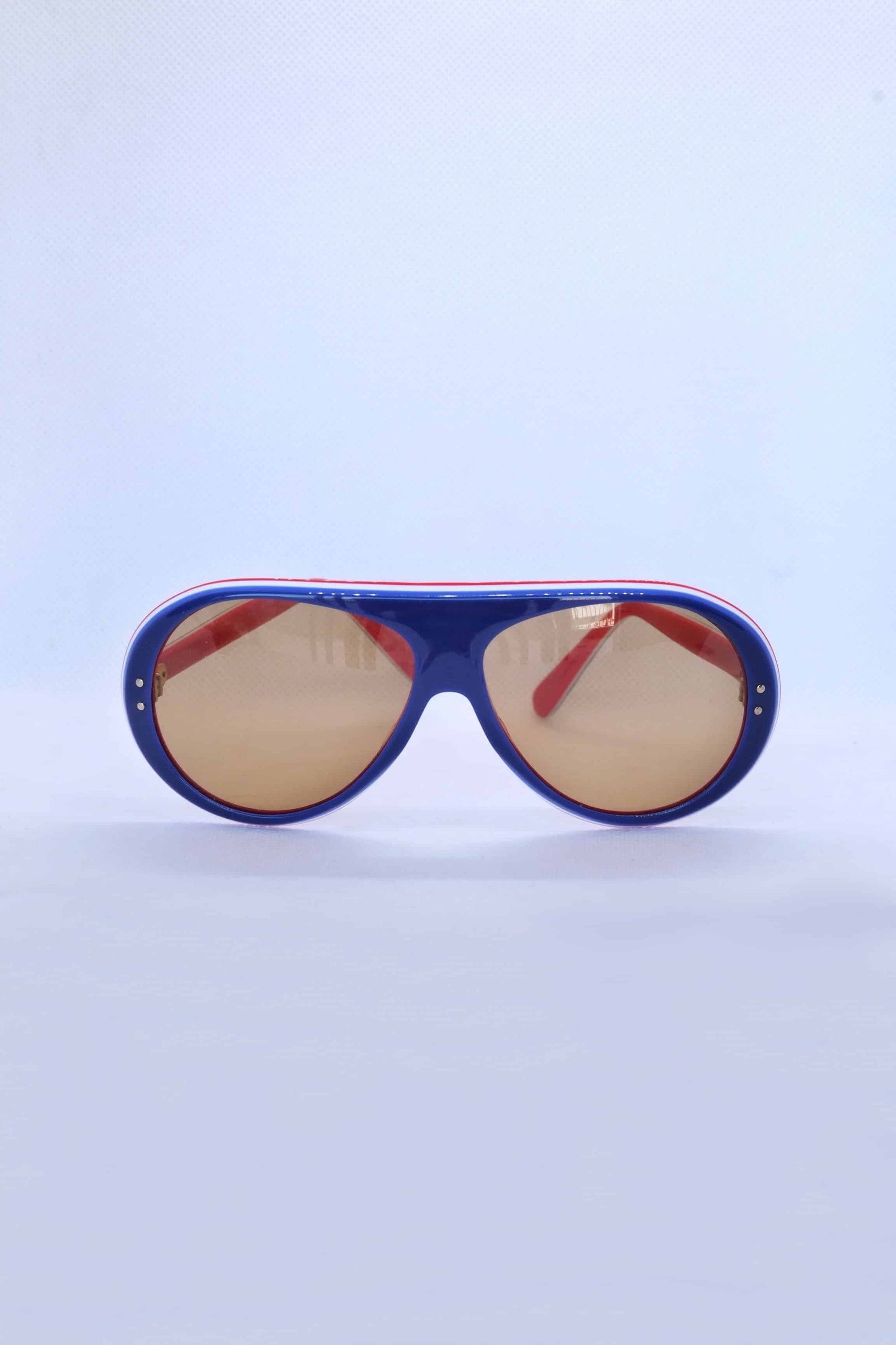 Vintage 70's Rally Coq Sunglasses in blue on white background