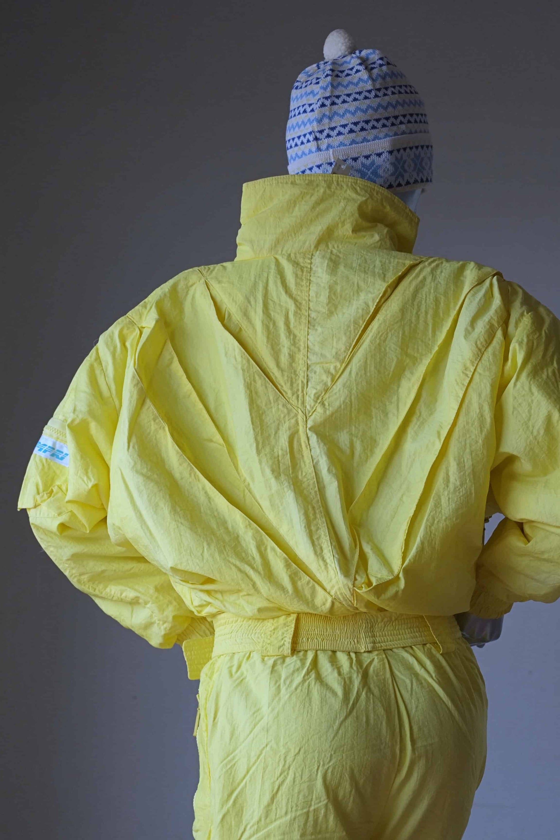 backside of the CAMPRI Vintage 90's Ski Suit in yellow