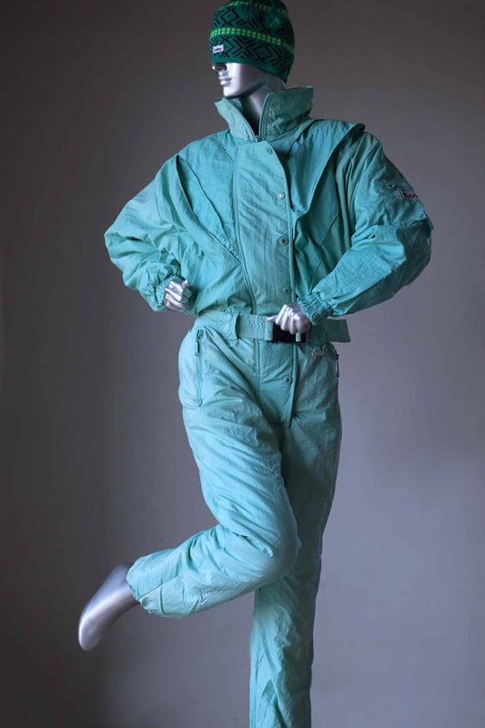 CAMPRI Vintage 90's Ski Suit in pistachio green displayed on mannequin