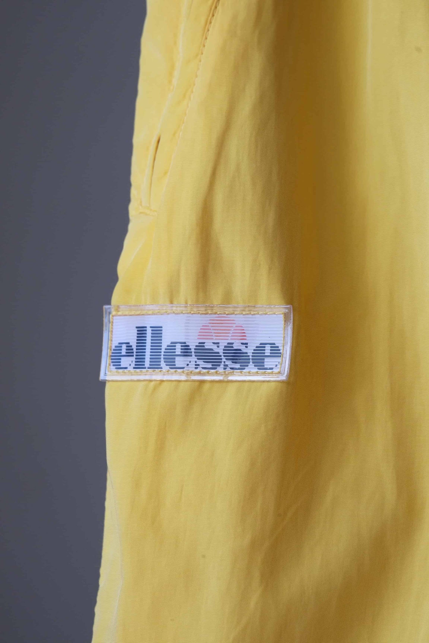 ellesse 90s ski pants yellow detail