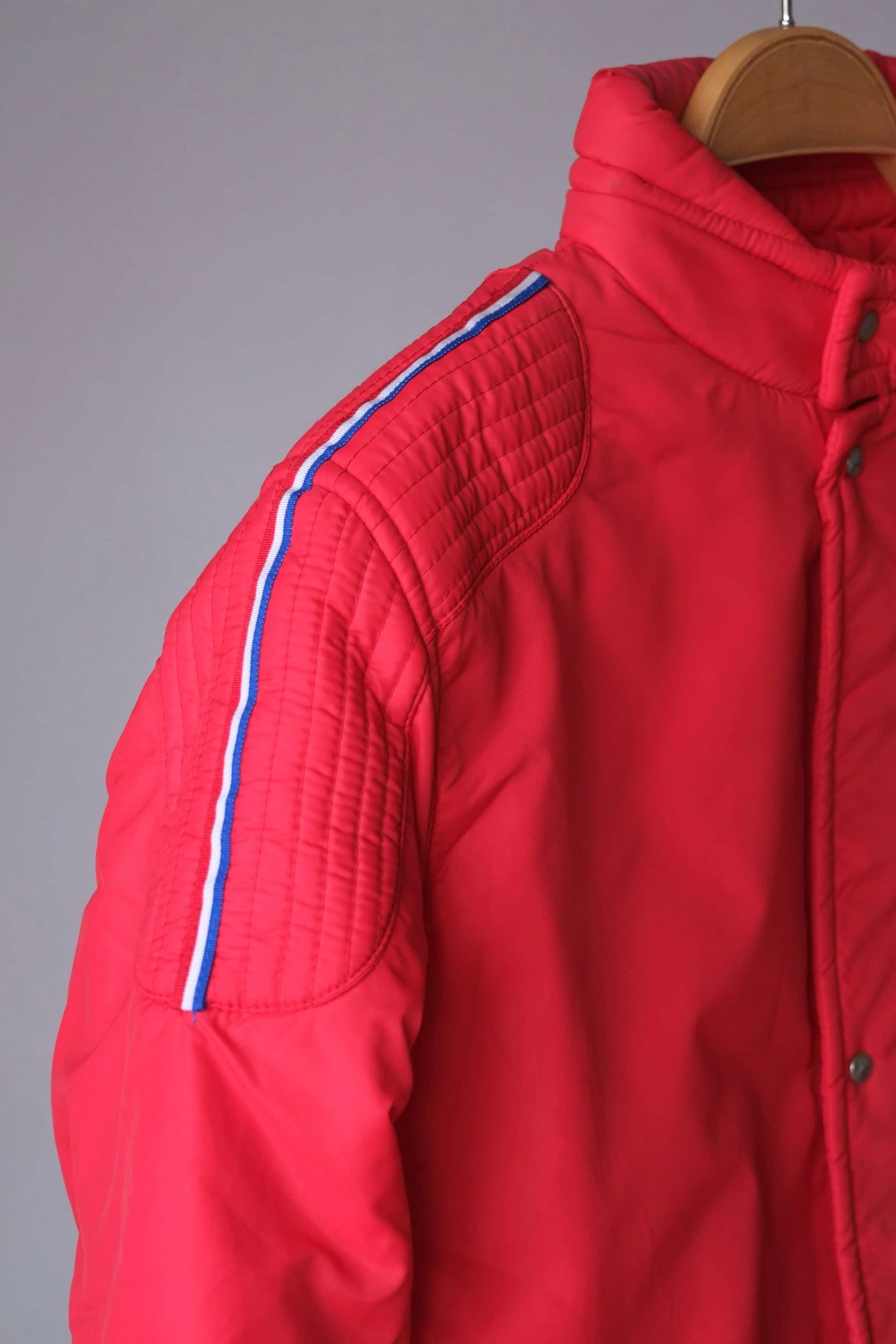 Close up view of red Vintage Men's 70's Ski Suit