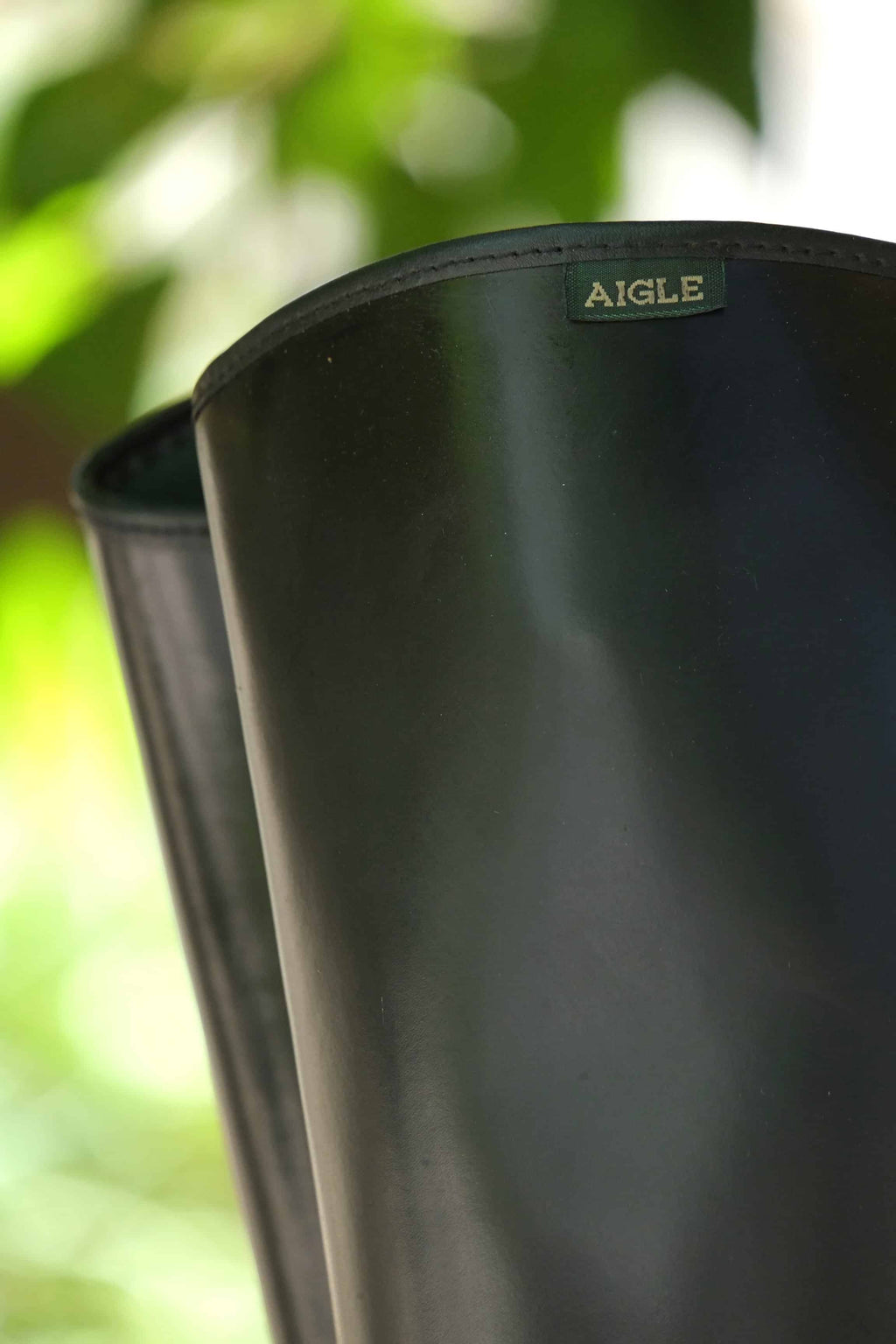 Close up of the Aigle tag on the hem of the boots