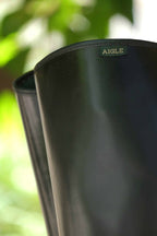 Close up of the Aigle tag on the hem of the boots