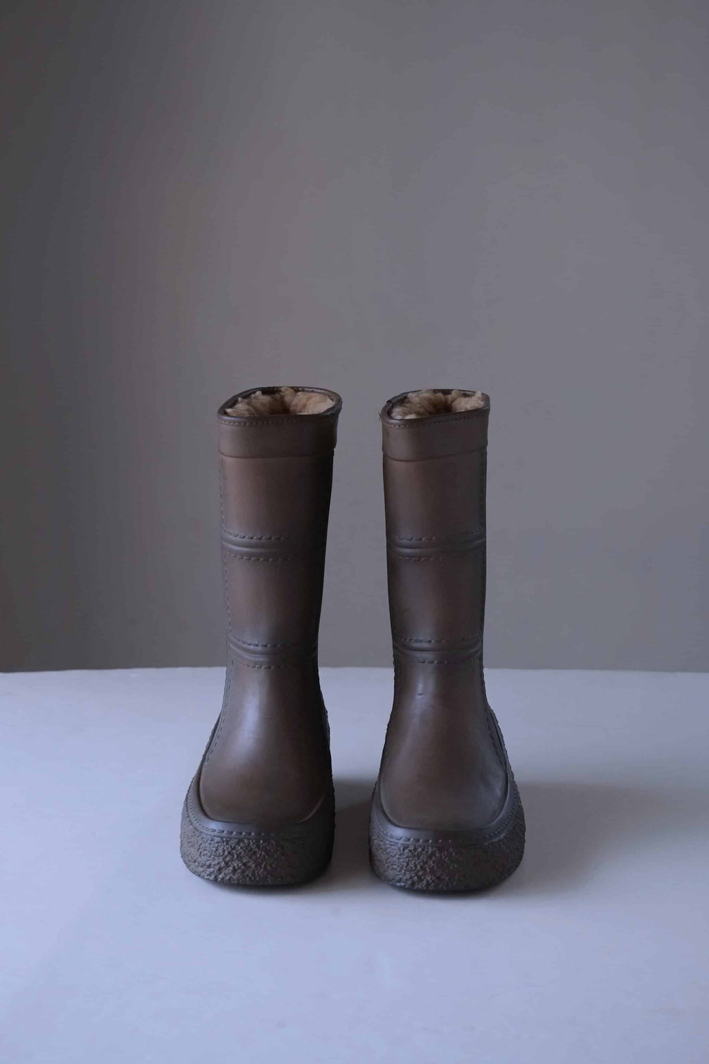 Brown rubber AIGLE Vintage Snow Boots facing camera