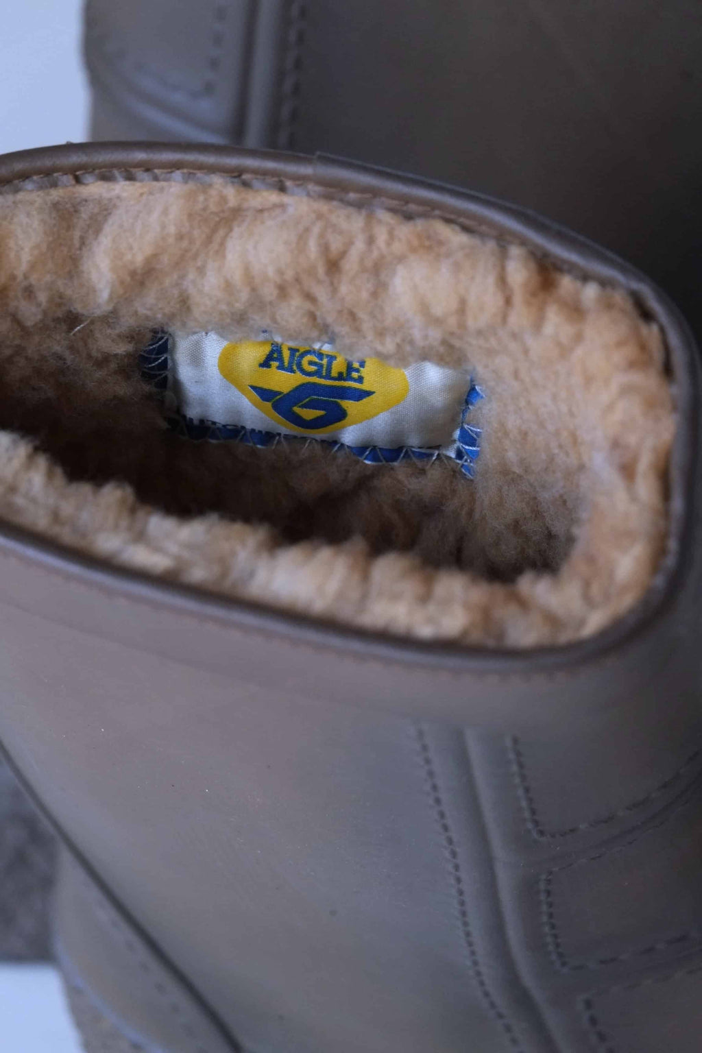 Close shot of the AIGLE label on brown rubber Vintage Snow Boots