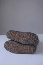 Shot of crepe soles of brown vintage rubber Aigle snow boots