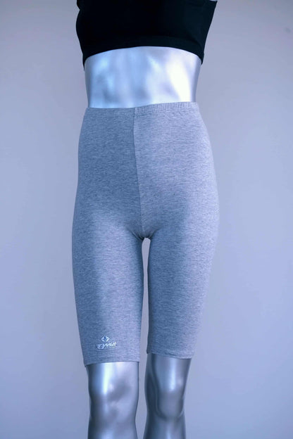Front view of vintage above the knee grey biker shorts on a silver mannequin.