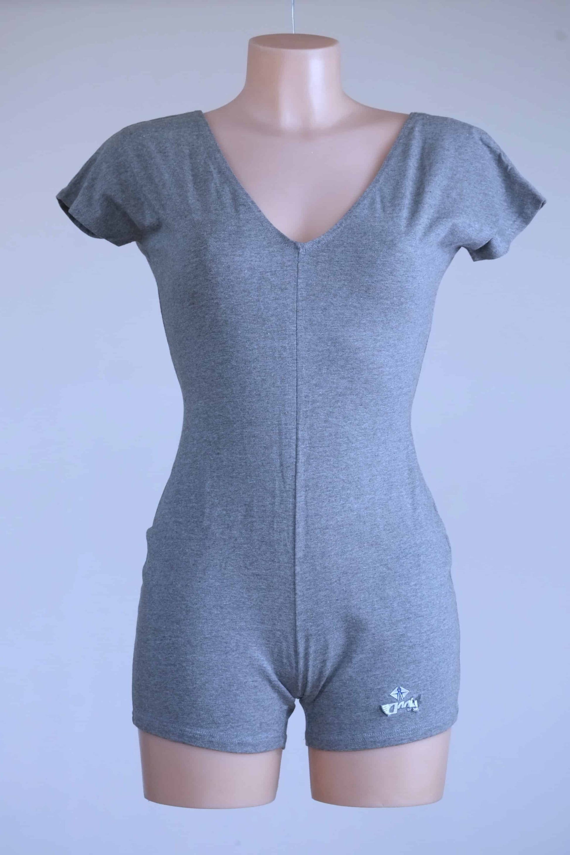 Heather grey Anniel women’s athletic romper shown on mannequin, featuring short sleeves and mid-thigh fit.