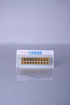Deadstock vintage Babolat Elastocross tennis string protectors in cream white, shown on its original retail card display packaging.