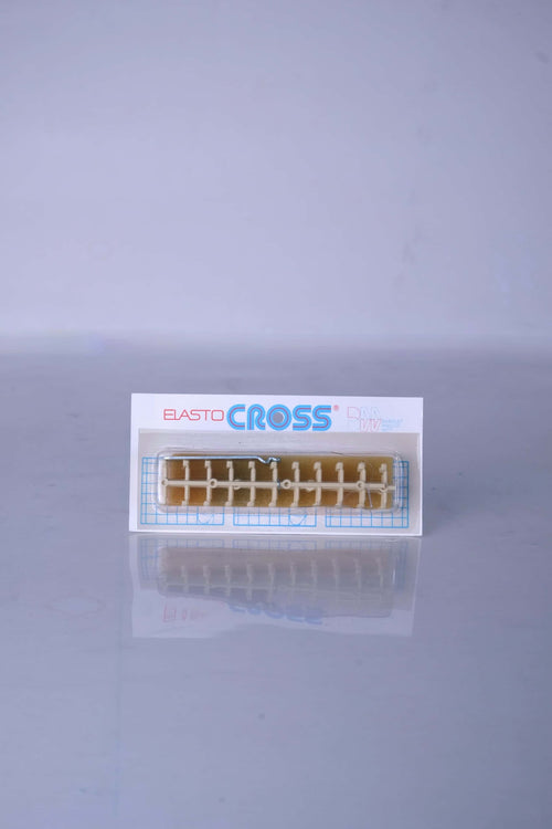 Deadstock vintage Babolat Elastocross tennis string protectors in cream white, shown on its original retail card display packaging.