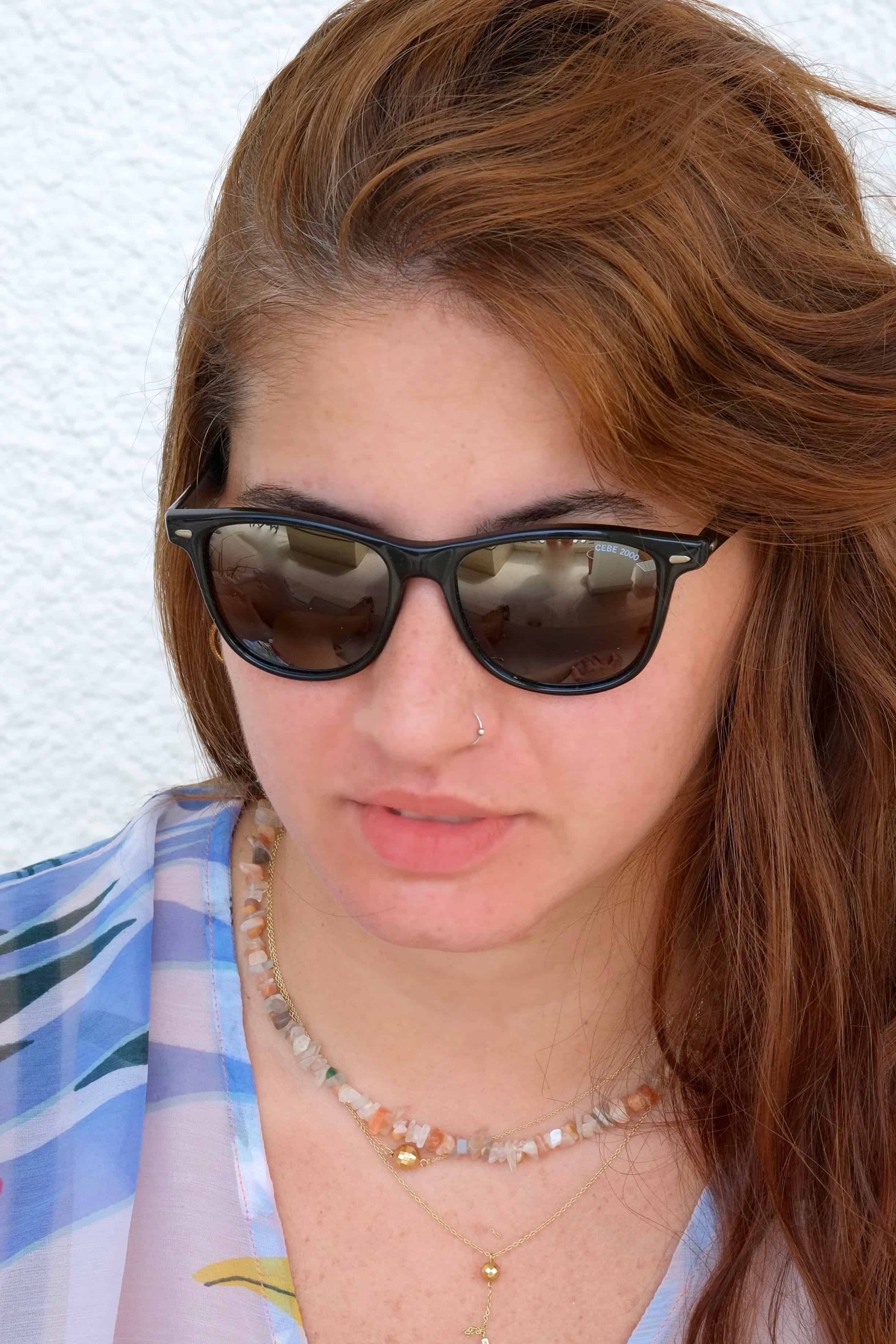 Black CÉBÉ Vintage Wayfarer Sunglasses on white background worn on model