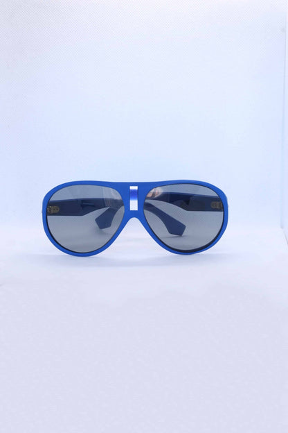 front view of vintage cébé sunglasses matte blue on white background