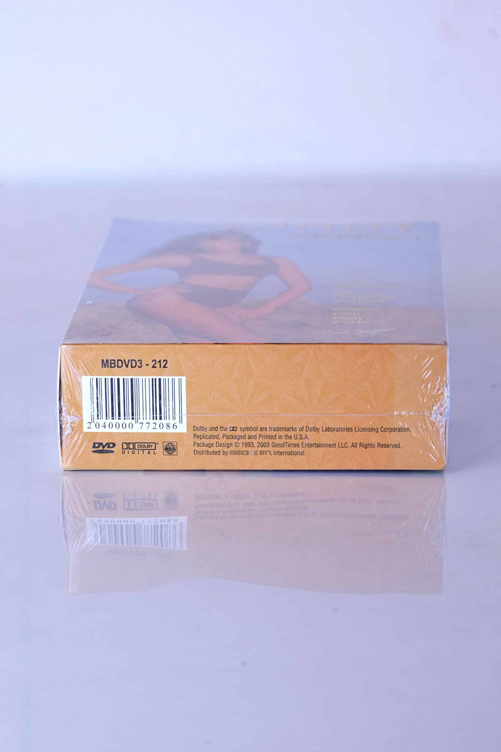 Bottom view of factory-sealed Cindy Crawford 3-disc DVD box set showing barcode 2040000772086 and Music Box Int'l distribution details.