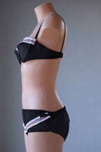 Side shot of black Vintage 60's Bikini on mannequin