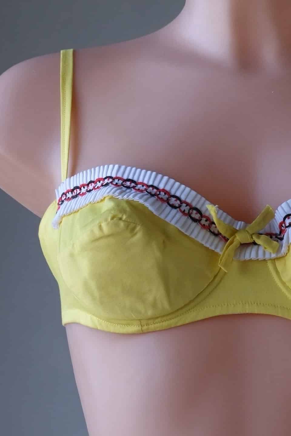 Close up of Yellow Vintage 60's Bikini on mannequin