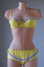 Yellow Vintage 60's Bikini on mannequin