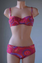 Multi pink pattern  Vintage 60's Crochet Bikini on mannequin