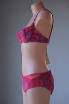 Multi pink pattern  Vintage 60's Crochet Bikini on mannequin from the side
