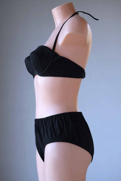 Side view Vintage Solid 60's Bikini in black worn on mannequin