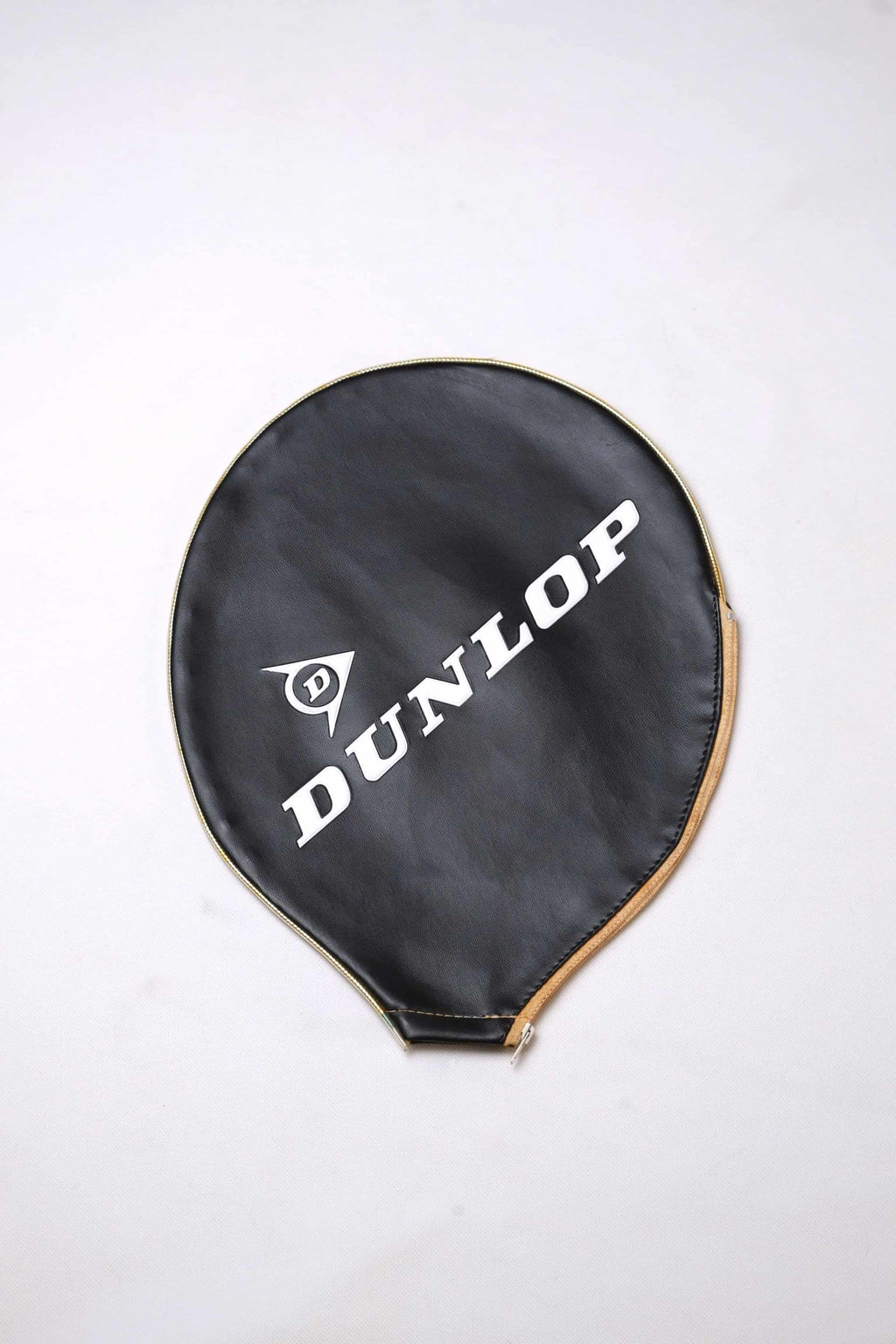 Vintage black vinyl Dunlop tennis racket zippered head cover with diagonal white branding, shown on a clean white backdrop.