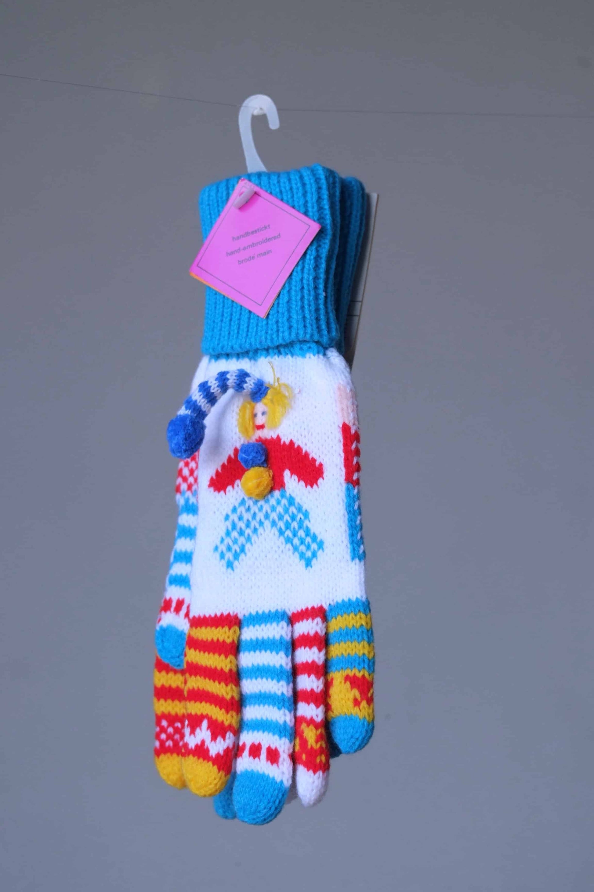 ERGEE Kids Wool Gloves in a turquoise and white clown design