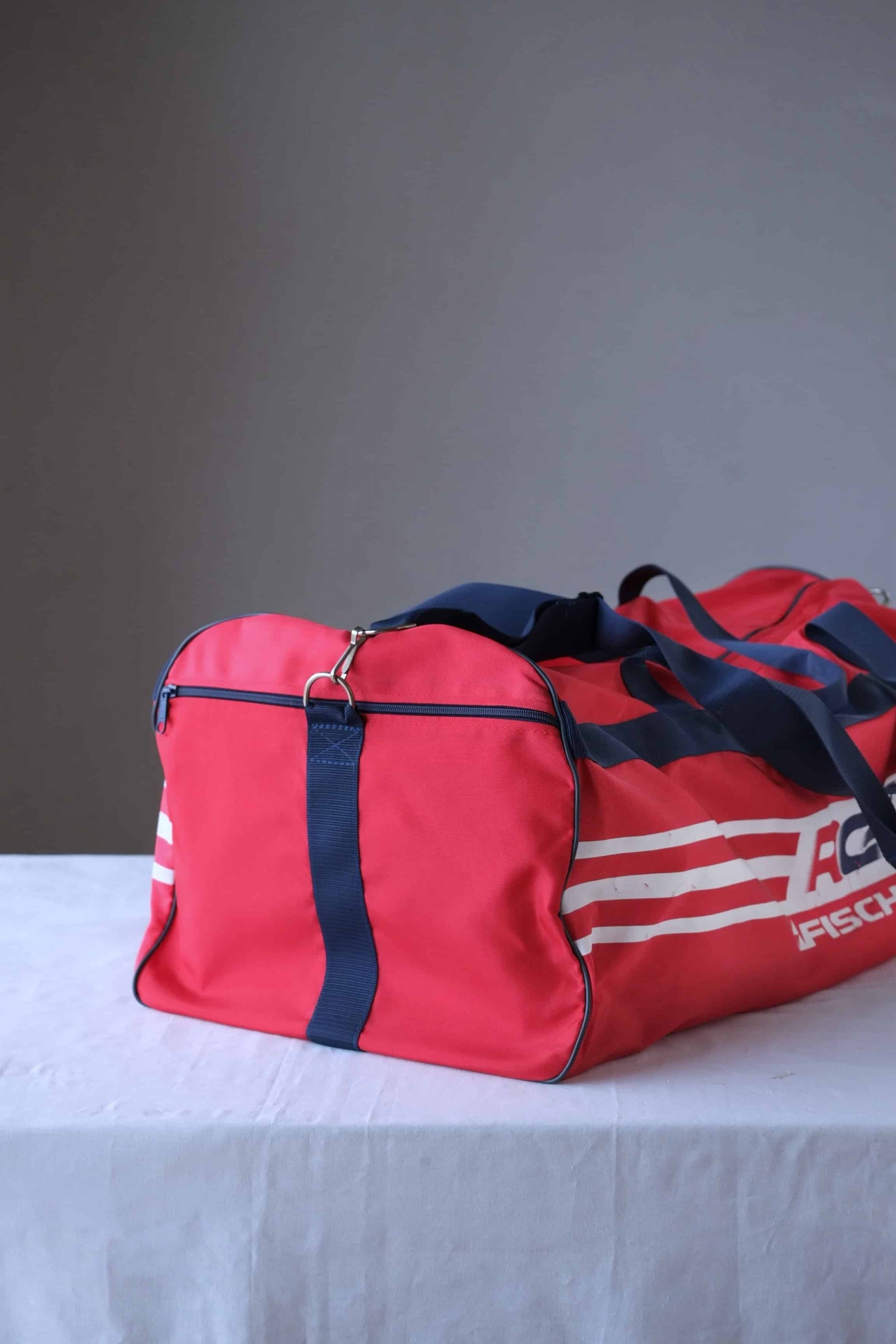Vintage Fischer Duffle Bag side red and navy