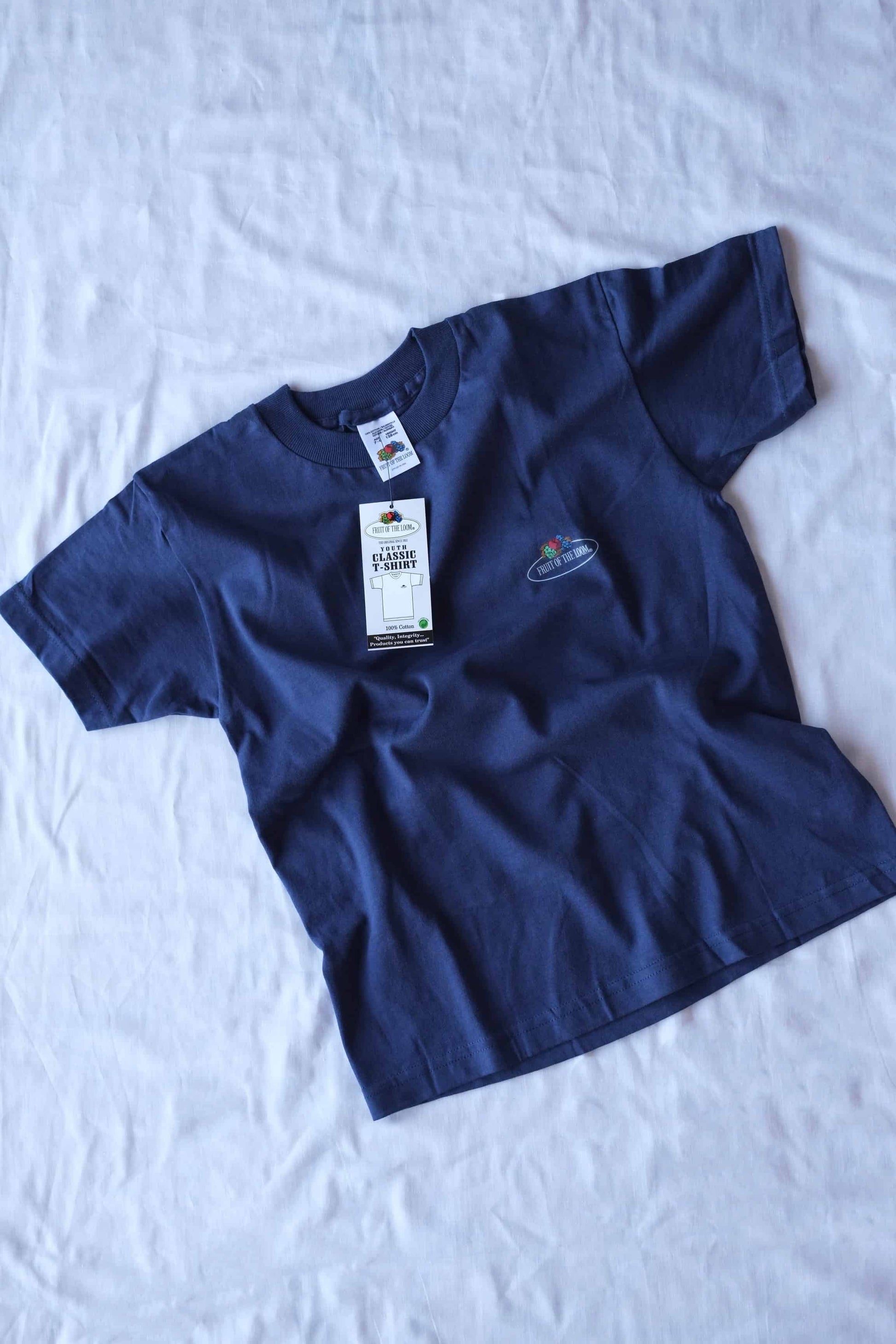 FRUIT OF THE LOOM Kids Classic T-shirt in color navy laid on white background