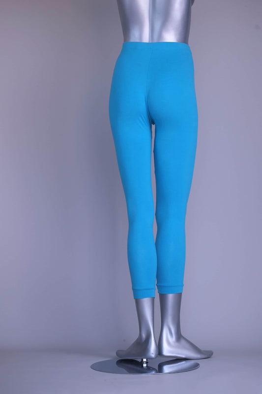 Back view of a silver mannequin wearing A pair of blue, vintage 90s GILDA MARX cropped leggings.